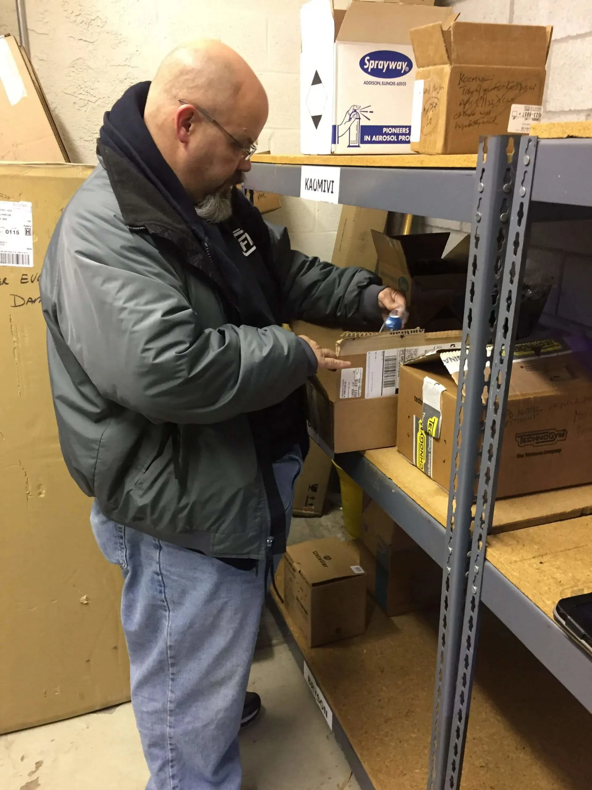 Bryan checking parts and making sure they match his orders