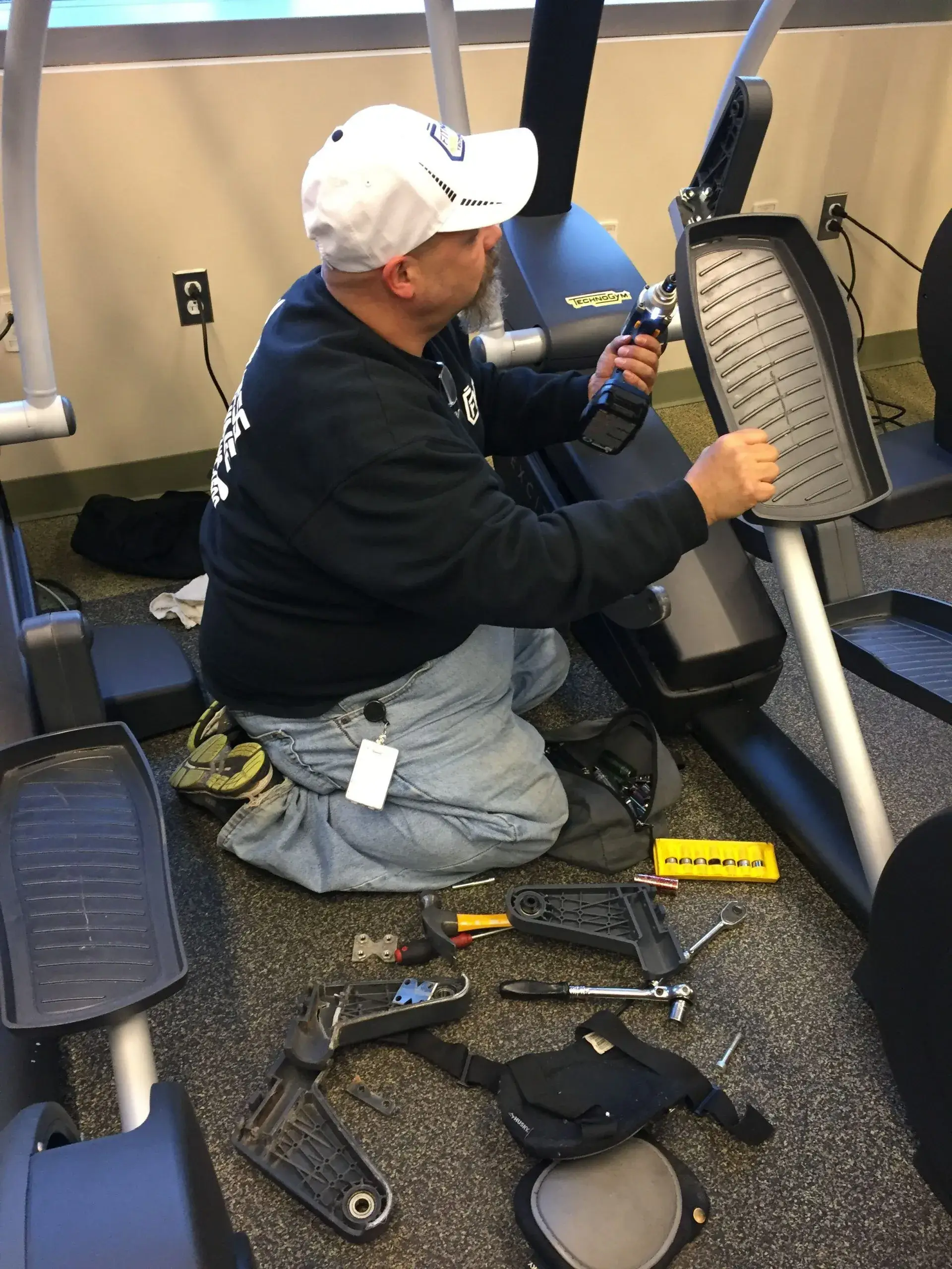 Bryan removing the machine parts